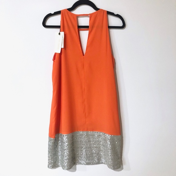 orange and silver dress